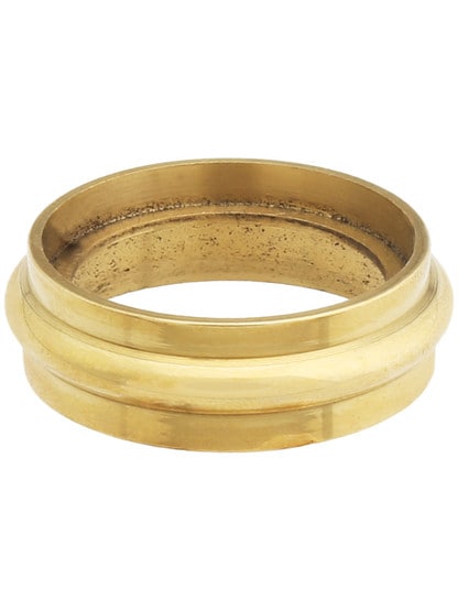 Small Plain Shallow Caster Socket or Ring in Unlacquered Brass.